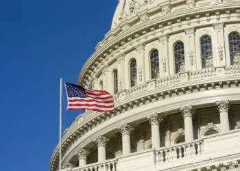 Picture of The Congressional building of The United States of America in Washington DC during spring time, with no people, and clear blue sky